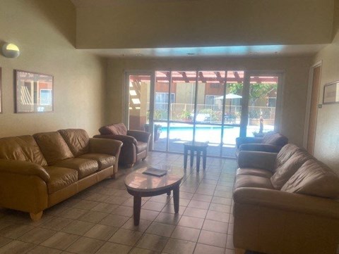 a living room with couches and a coffee table
